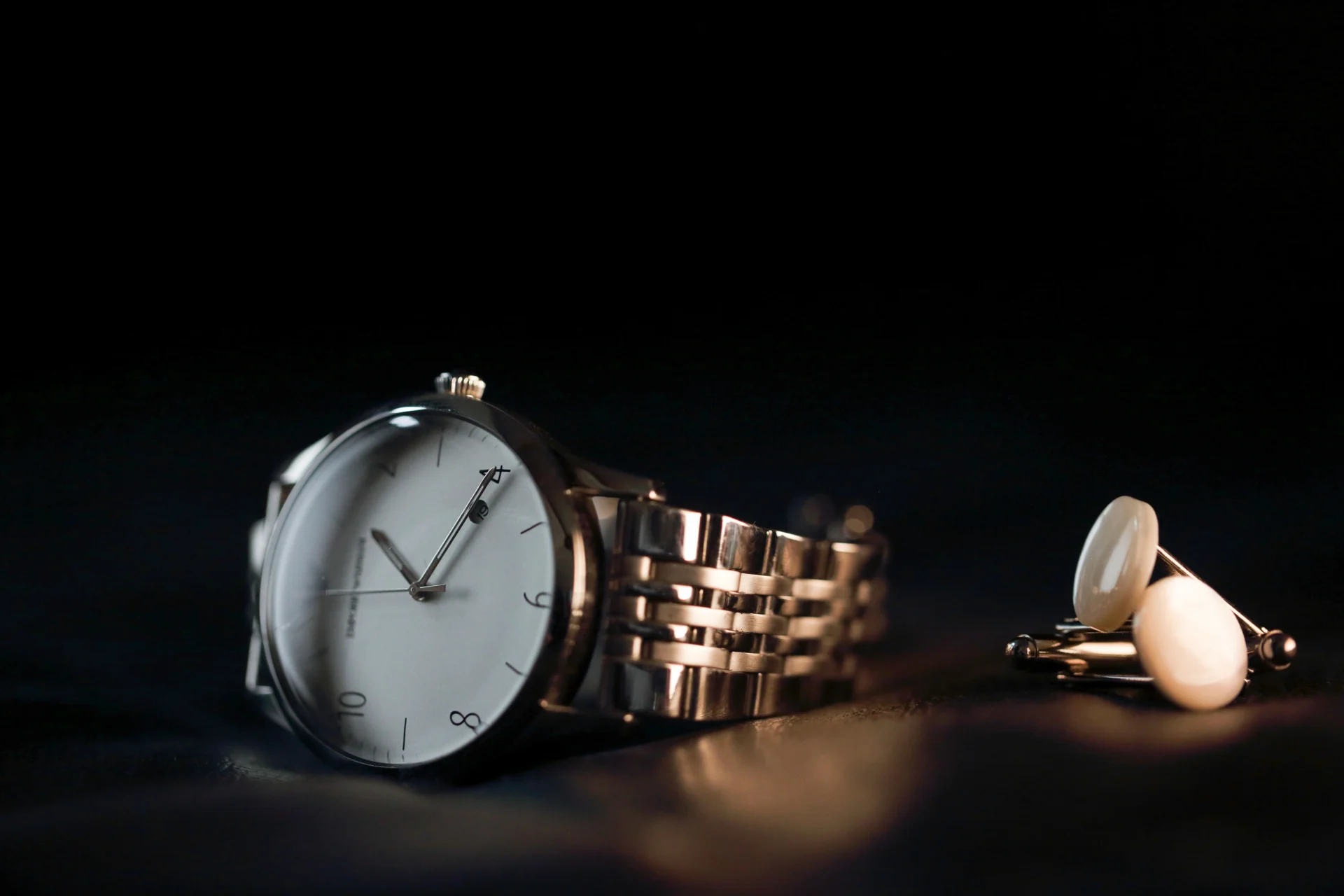 Man's cuff links and watch — product detail